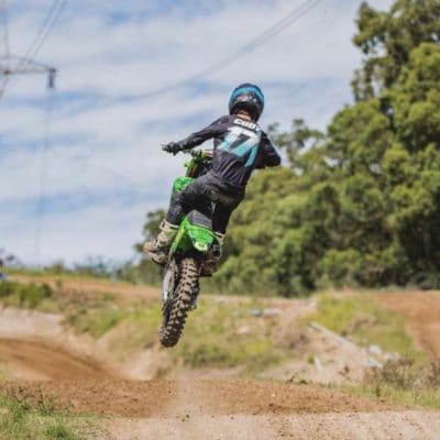 Intent Mx Athlete Cody Kilpatrick aboard his kx250f shredding in the infinite dirt bike jersey, pant and glove combo.